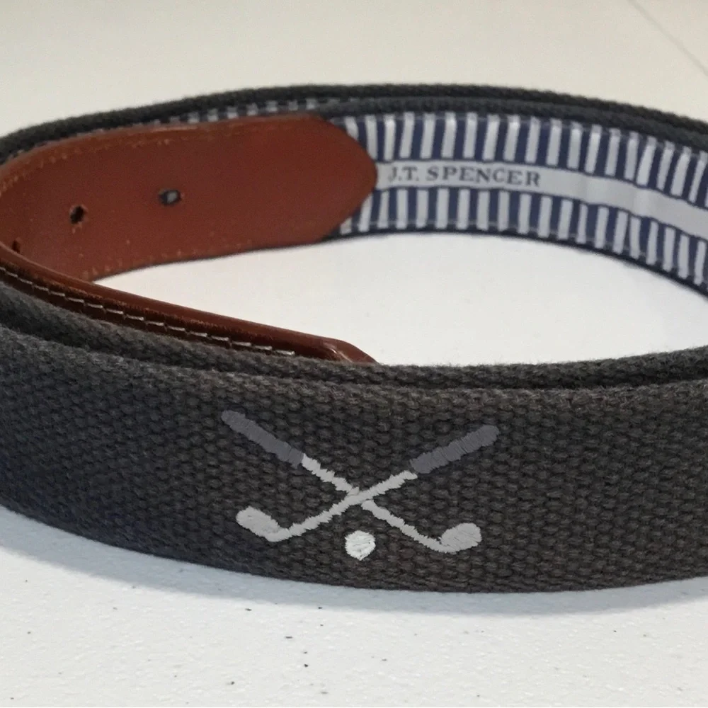 Men's Grey Woven Belt  with Golf Clubs and has Brown Leather Trim